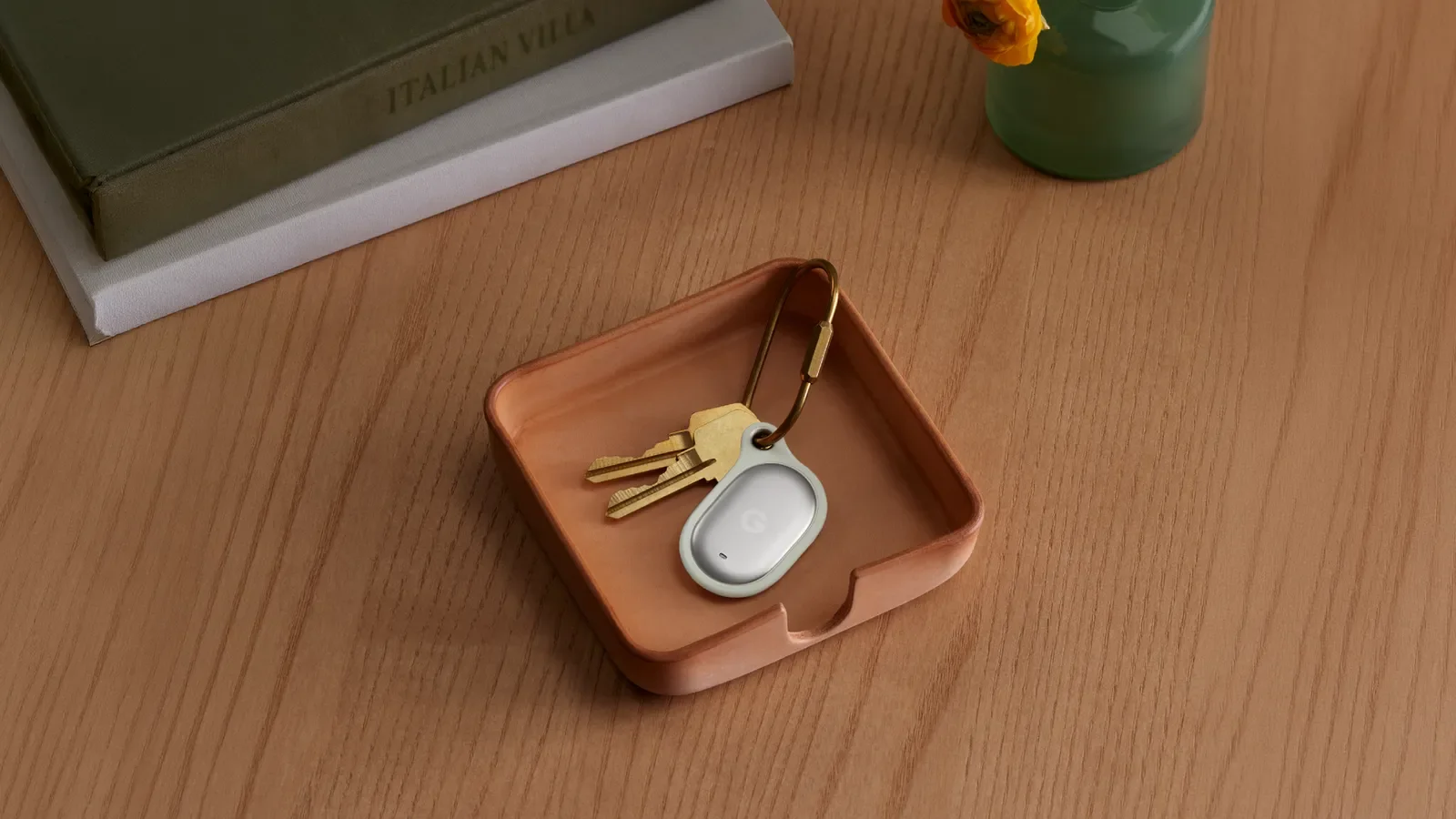 A Google Pixel Tag placed with a set of everyday keys.